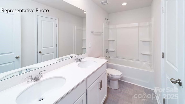 9223 Poquoson Dr, Gastonia, NC 28056 - full bath featuring double vanity, shower / washtub combination, tile patterned floors, and recessed lighting