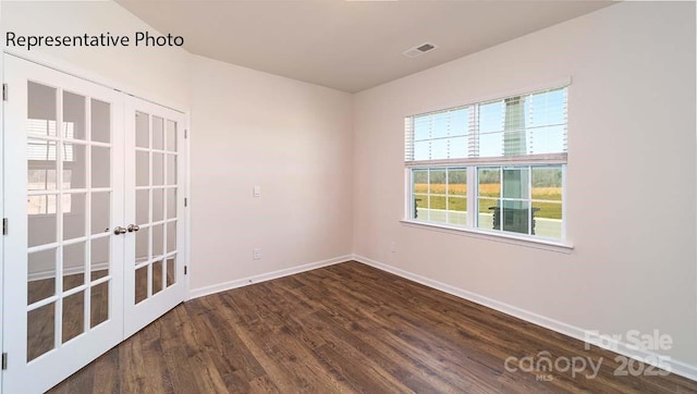 9223 Poquoson Dr, Gastonia, NC 28056 - unfurnished room featuring french doors and wood finished floors