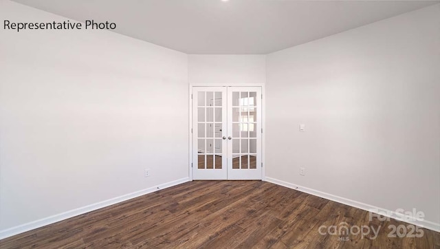 9223 Poquoson Dr, Gastonia, NC 28056 - spare room with french doors and dark wood-style flooring