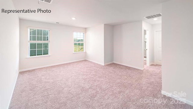 9223 Poquoson Dr, Gastonia, NC 28056 - carpeted empty room featuring recessed lighting