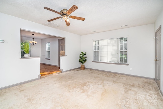 3630 Melrose Cottage Dr, Matthews, NC 28105 - spare room featuring a chandelier, carpet floors, and a ceiling fan