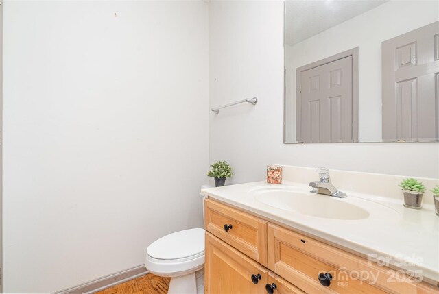 3630 Melrose Cottage Dr, Matthews, NC 28105 - half bathroom featuring vanity and toilet