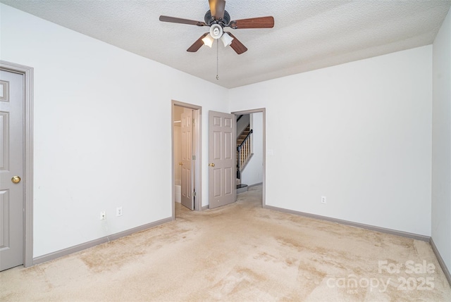 3630 Melrose Cottage Dr, Matthews, NC 28105 - unfurnished bedroom with carpet flooring, a textured ceiling, a ceiling fan, and ensuite bath