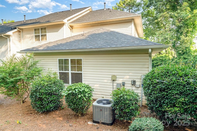 3630 Melrose Cottage Dr, Matthews, NC 28105 - view of property exterior with a shingled roof and a central air condition unit