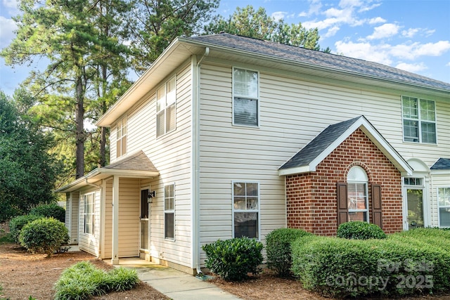3630 Melrose Cottage Dr, Matthews, NC 28105 - view of front of home featuring a shingled roof and brick siding