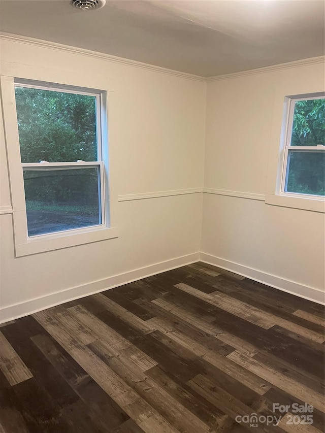 576 Morrow Motor Rd, Forest City, NC 28043 - unfurnished room featuring crown molding and dark wood-type flooring