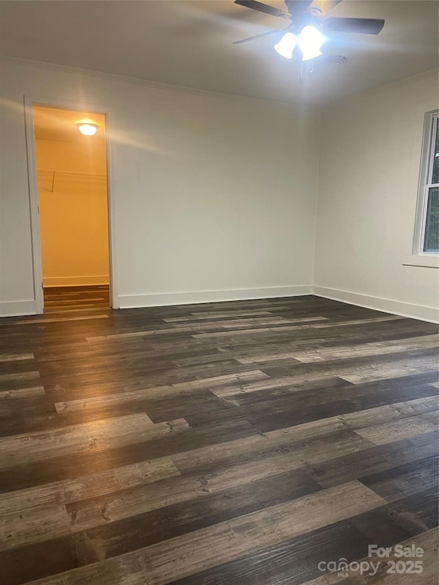 576 Morrow Motor Rd, Forest City, NC 28043 - unfurnished room featuring a ceiling fan and dark wood-type flooring