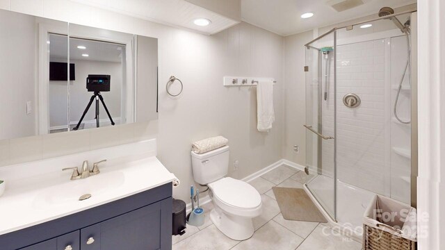 304 Sowers Ferry Rd, Salisbury, NC 28144 - full bath with vanity, a shower stall, tile patterned floors, and recessed lighting