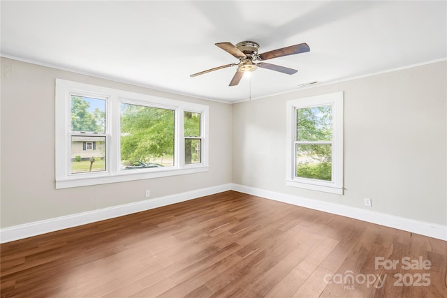 716 Wilson Rd, Salisbury, NC 28144 - spare room featuring wood finished floors, ornamental molding, and ceiling fan