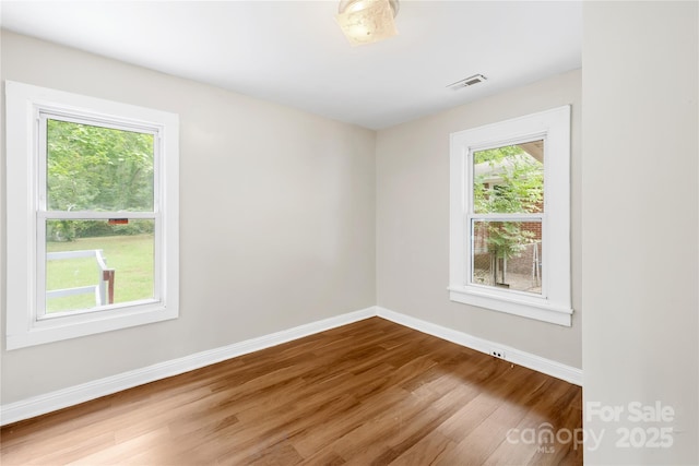 716 Wilson Rd, Salisbury, NC 28144 - spare room with wood finished floors and baseboards