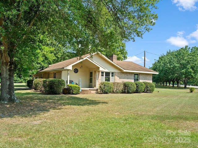 2212 Jb Denton Rd, Lancaster, SC 29720 - ranch-style house with a chimney and a front yard