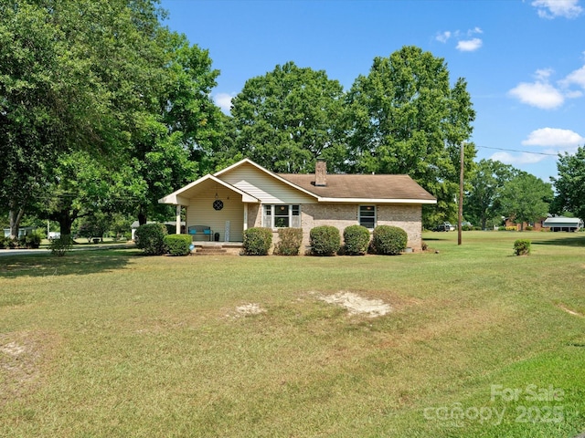 2212 Jb Denton Rd, Lancaster, SC 29720 - single story home with a front yard and a chimney