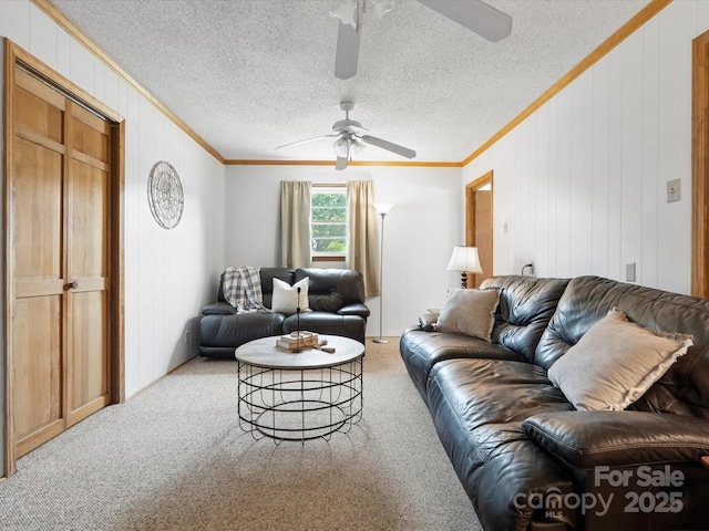 2212 Jb Denton Rd, Lancaster, SC 29720 - living room with ceiling fan, ornamental molding, carpet floors, and wooden walls