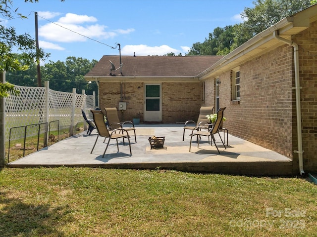 2212 Jb Denton Rd, Lancaster, SC 29720 - view of patio featuring an outdoor fire pit