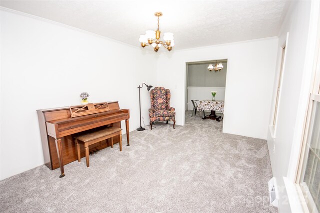 224 Mountain View Rd, Statesville, NC 28625 - living area with a chandelier, carpet floors, and crown molding