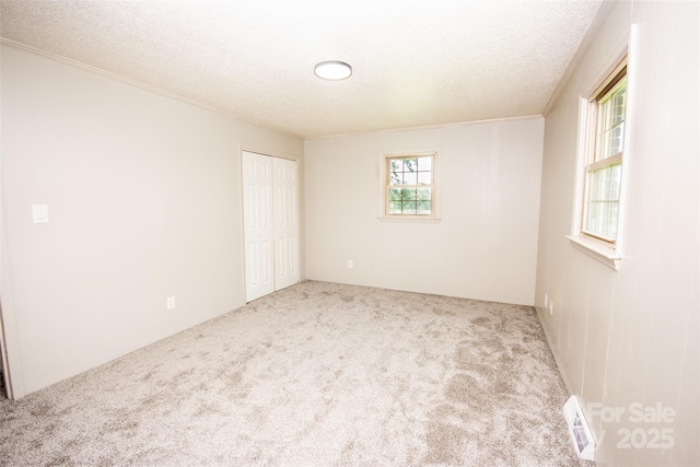 224 Mountain View Rd, Statesville, NC 28625 - unfurnished room with carpet flooring and a textured ceiling