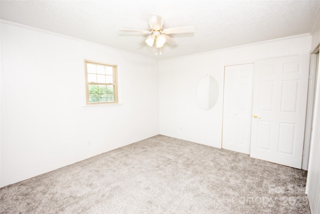 224 Mountain View Rd, Statesville, NC 28625 - unfurnished bedroom featuring carpet, crown molding, a closet, and ceiling fan