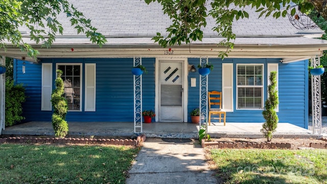 1302 1st Ave NW, Hickory, NC 28601 - property entrance with a porch and a shingled roof