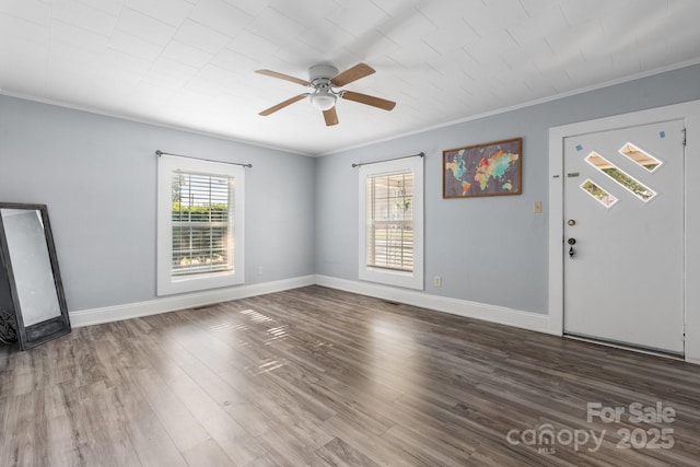 1302 1st Ave NW, Hickory, NC 28601 - unfurnished living room with crown molding, ceiling fan, and wood finished floors