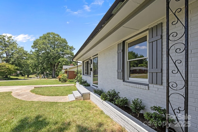 3422 Dublin Rd, Charlotte, NC 28208 - view of side of home with brick siding and a lawn