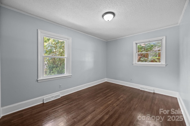 3422 Dublin Rd, Charlotte, NC 28208 - empty room featuring dark wood-style floors, a textured ceiling, plenty of natural light, and crown molding