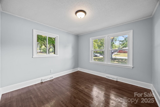 3422 Dublin Rd, Charlotte, NC 28208 - unfurnished room featuring healthy amount of natural light, ornamental molding, a textured ceiling, and dark wood-style flooring