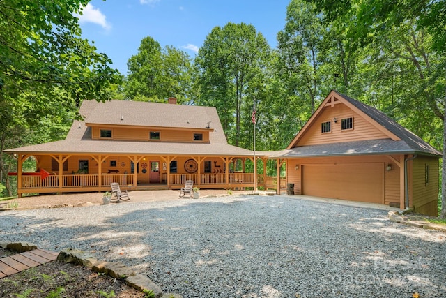 492 Henry Mountain Rd, Brevard, NC 28712 - view of front of home featuring covered porch, a chimney, and a shingled roof