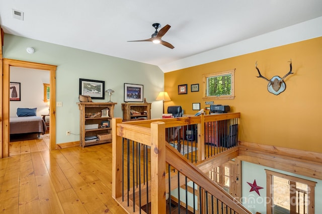 492 Henry Mountain Rd, Brevard, NC 28712 - corridor with light wood finished floors and an upstairs landing