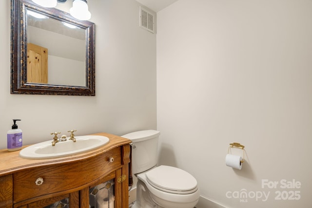 492 Henry Mountain Rd, Brevard, NC 28712 - bathroom with toilet and vanity