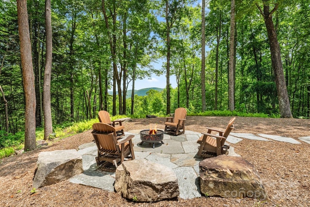 492 Henry Mountain Rd, Brevard, NC 28712 - view of patio featuring an outdoor fire pit