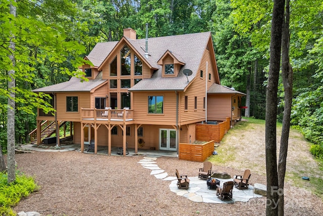 492 Henry Mountain Rd, Brevard, NC 28712 - rear view of property with an outdoor fire pit, stairs, french doors, a deck, and a patio