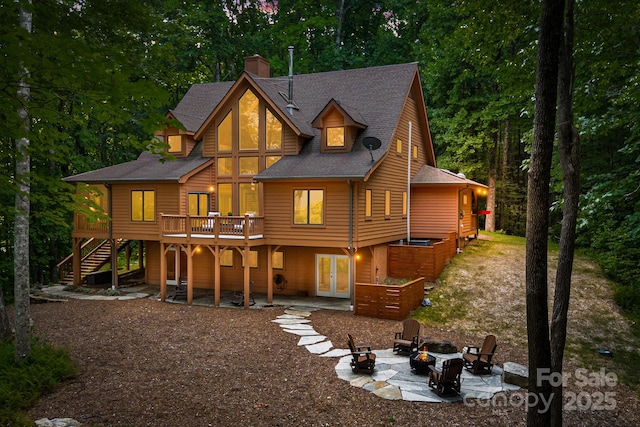 492 Henry Mountain Rd, Brevard, NC 28712 - back of house featuring stairway, a fire pit, a patio, a deck, and french doors
