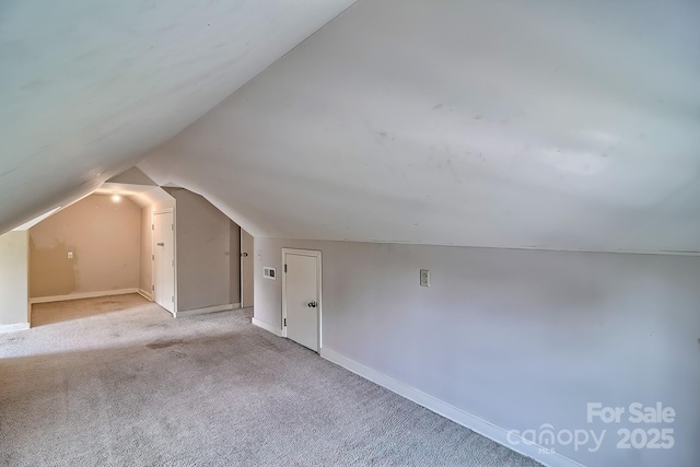 315 E Marion St, Kershaw, SC 29067 - additional living space with vaulted ceiling and light carpet