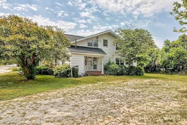 315 E Marion St, Kershaw, SC 29067 - view of front of property featuring a front lawn and roof with shingles