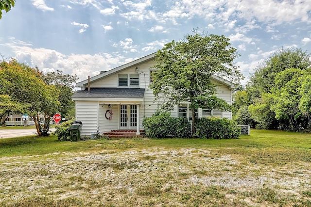 315 E Marion St, Kershaw, SC 29067 - view of property hidden behind natural elements with french doors and a front lawn