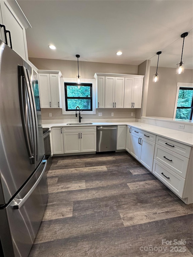 2031 S Oconeechee Ave, Black Mountain, NC 28711 - kitchen featuring stainless steel appliances, plenty of natural light, light countertops, and recessed lighting