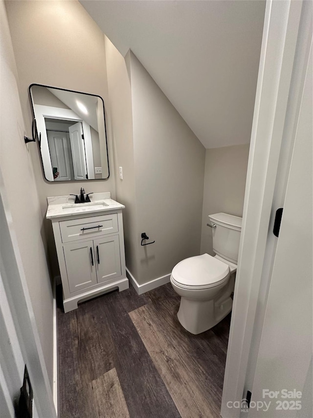 2031 S Oconeechee Ave, Black Mountain, NC 28711 - half bathroom featuring wood finished floors and vanity