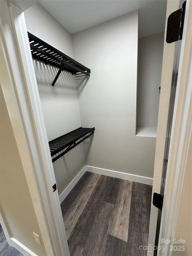 2031 S Oconeechee Ave, Black Mountain, NC 28711 - walk in closet with dark wood-type flooring