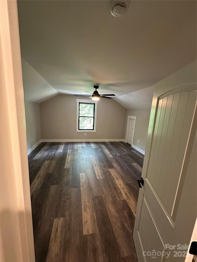 2031 S Oconeechee Ave, Black Mountain, NC 28711 - bonus room with dark wood finished floors, a ceiling fan, and lofted ceiling