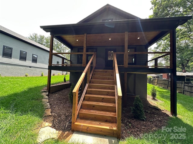 2031 S Oconeechee Ave, Black Mountain, NC 28711 - view of front of property with a front yard, stairs, and board and batten siding