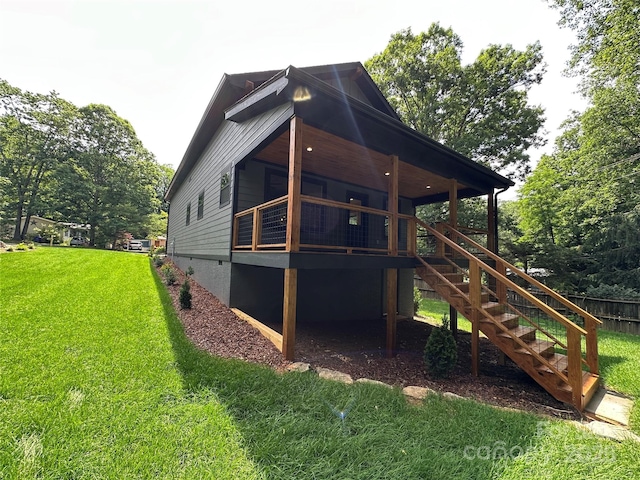 2031 S Oconeechee Ave, Black Mountain, NC 28711 - view of side of home featuring a yard and stairway