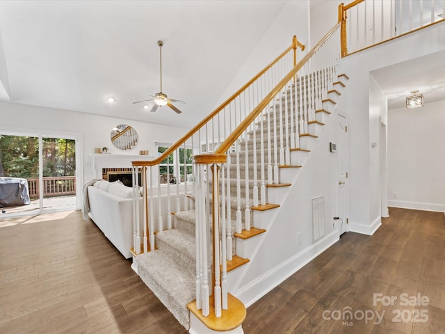 10527 Breamore Dr, Charlotte, NC 28270 - stairway featuring wood finished floors, a ceiling fan, and recessed lighting