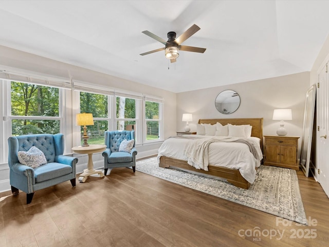 10527 Breamore Dr, Charlotte, NC 28270 - bedroom with wood finished floors and a ceiling fan