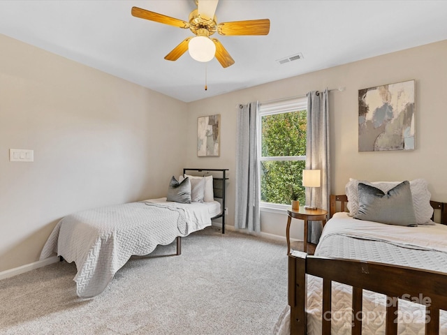 10527 Breamore Dr, Charlotte, NC 28270 - carpeted bedroom featuring baseboards and a ceiling fan