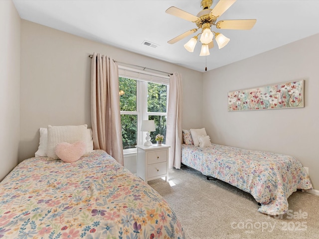 10527 Breamore Dr, Charlotte, NC 28270 - carpeted bedroom with a ceiling fan