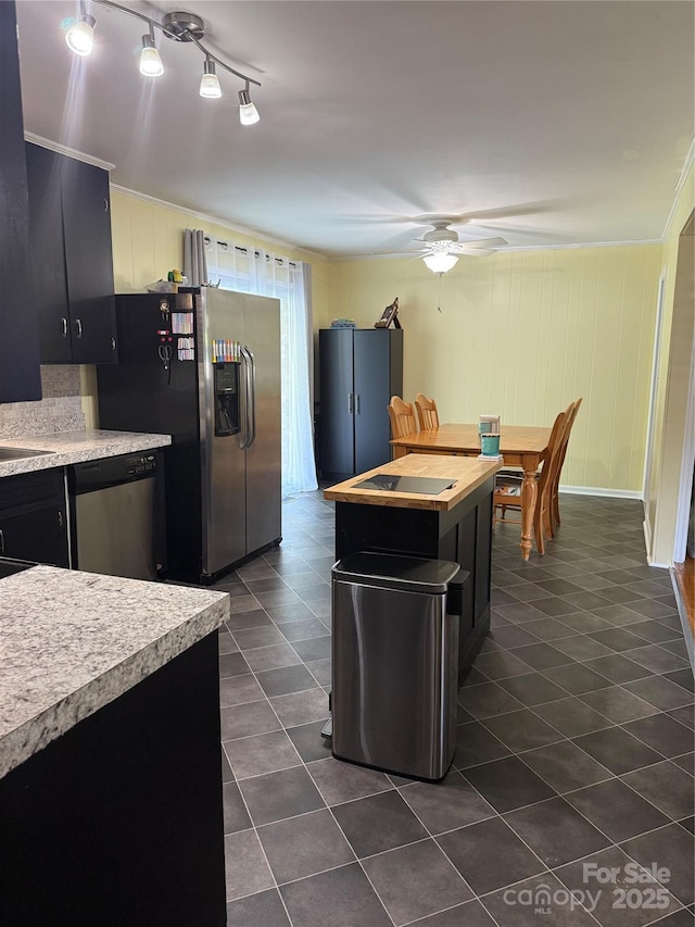 804 Lee St, Kings Mountain, NC 28086 - kitchen with appliances with stainless steel finishes, ceiling fan, light countertops, and dark cabinetry