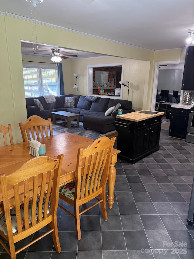 804 Lee St, Kings Mountain, NC 28086 - dining room with dark tile patterned flooring and a ceiling fan