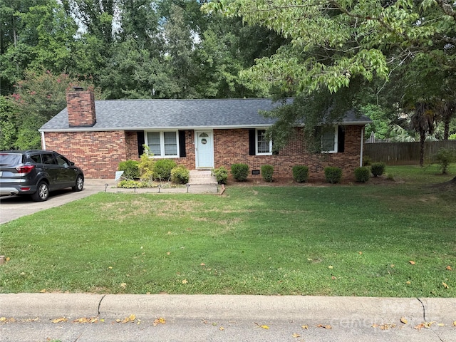 804 Lee St, Kings Mountain, NC 28086 - ranch-style home featuring brick siding, a chimney, a shingled roof, and concrete driveway