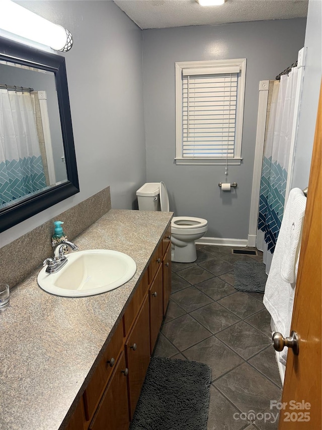 804 Lee St, Kings Mountain, NC 28086 - full bath featuring vanity, tile patterned floors, and a shower with curtain