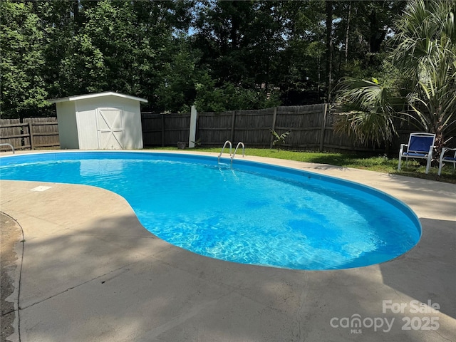 804 Lee St, Kings Mountain, NC 28086 - view of pool featuring a fenced backyard, a storage unit, and a patio